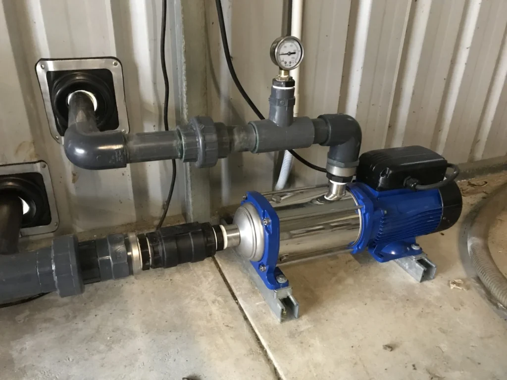 Water pump with pressure gauge.