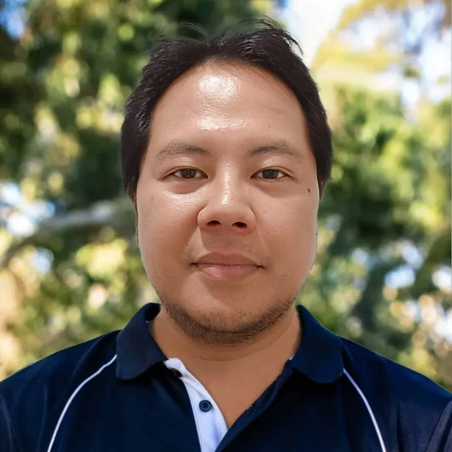 Man in blue polo shirt